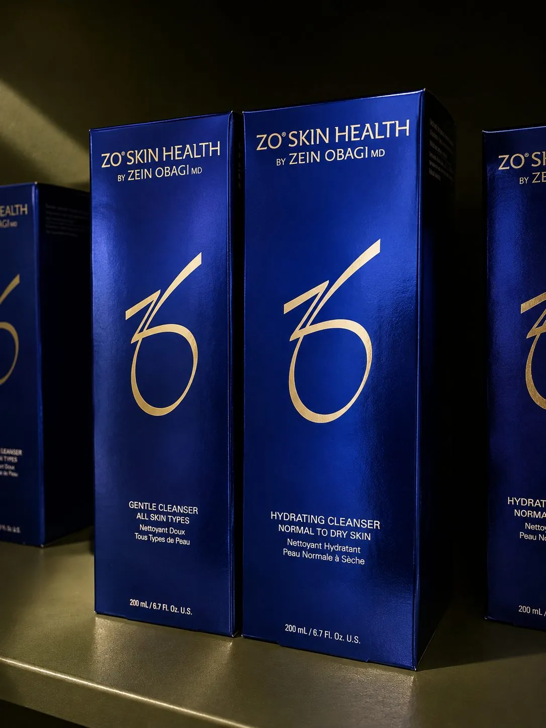ZO Skin Health Gentle Cleanser and Hydrating Cleanser boxes on the Studio shelf